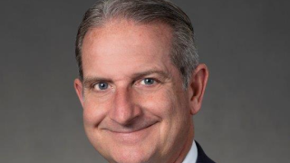 Portrait photo of Marc Kosak.