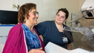 A women getting a mammogram