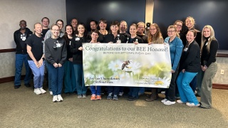 Billie Pearl, an occupational therapist at Champlain Valley Physicians Hospital, was surprised as the hospital’s most recent BEE Award honoree during a ceremony with coworkers. 