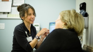 Dr. Sandoval talking with patient