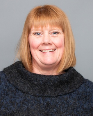 Portrait of Michelle LeBeau.