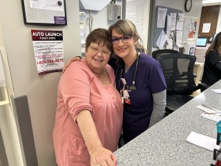Emergency department nurse Sara Tupia (right) and Cindy Scott share a moment of gratitude after Cindy’s stroke scare. 