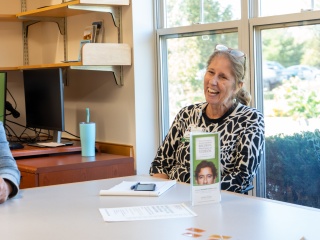 Peggy Weaver, LADC, meets with a patient in a primary care office.