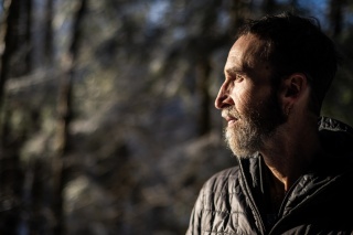 Kurt Budliger, a Vermont photographer, poses for a photo.