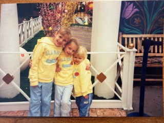 Siblings Kaitlin, Kimberly and Lauren Evans pose for a photo.