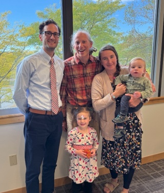 Jonathan Flyer, MD poses for a group photo with the Wenzler family. 