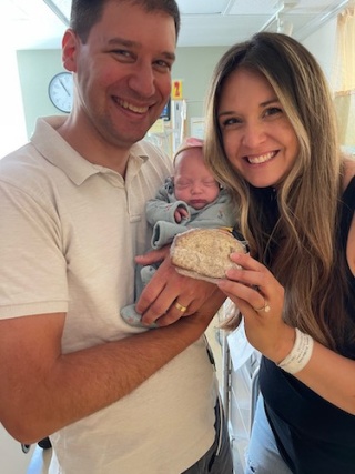 Fitzhugh family poses with their premature baby, Heidi, at the UVM Children's Hospital NICU.