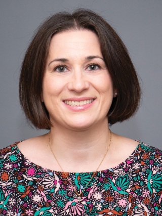 Headshot of Caroline Hesko, MD, a Pediatric Oncologist and Assistant Professor Of Oncology.