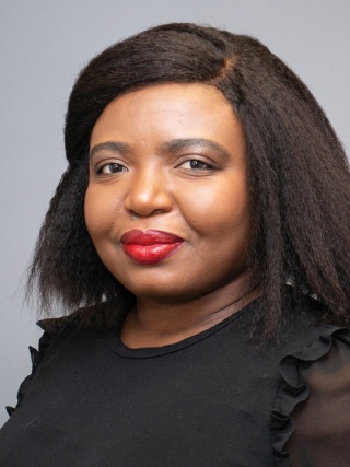 Headshot of Chidinma N. Enyinna, MD, a Nephrologist.