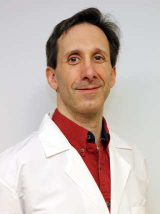 Headshot of Christopher Sakal, MD, an Internal Medicine Physician and Hospitalist.