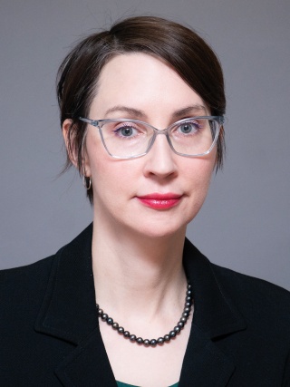 Headshot of Elly A. Riser, MD, MPH, an Internal Medicine Physician and Hospitalist.