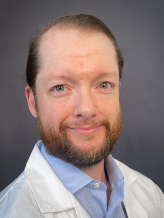 Headshot of Emerson Floyd, IV, MD, Attending Emergency Physician and Assistant Professor of Emergency Medicine