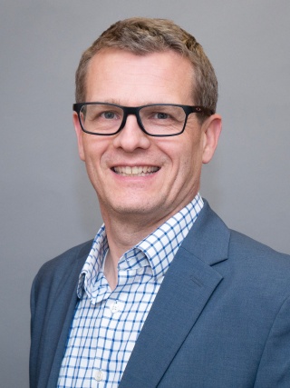 Headshot of Jan H. Denkmann, MD, a Cardiologist.