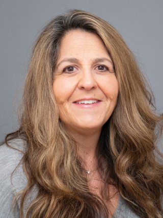 Headshot of Laura L. Wainer, NP, a Psychiatric Nurse Practitioner.