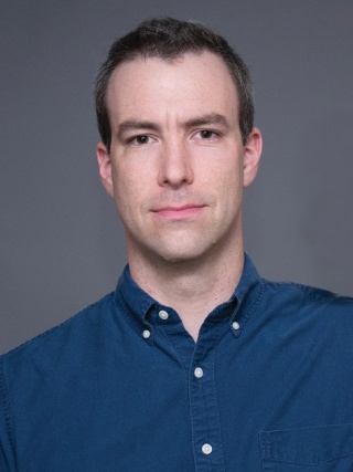 Headshot of Samuel (Sam) Loren, MD, a Neonatologist.