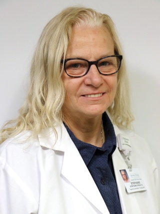 Headshot of Stephanie Spear, PA-C, a Surgical Physician Assistant.