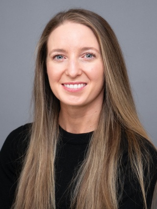 Headshot of Erin T. Ostby, MD, an Ear Nose and Throat Surgeon.