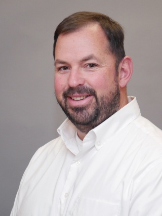 Headshot of Justin Hurlburt, DMD, a Dentist.