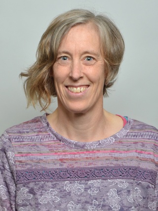 Headshot of Linda Helm, PT, a Physical Therapist.