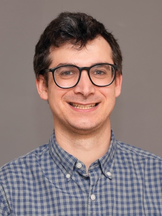 Headshot of Cameron Ulmer, MD, a Pediatric Hospitalist.