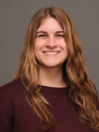 Headshot of Chelsea Curtis, RD, a Registered Dietician.