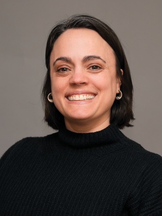 Headshot of Elise Tarbi, AGPCNP-BC, NP, PhD, an Adult Gerontology Primary Care Nurse Practitioner.