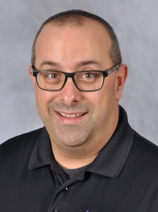 Headshot of Joshua LaDuke.