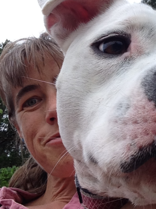 Tiffany Bombard takes selfie with her dog.