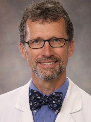 Headshot of Christian Bean, MD.