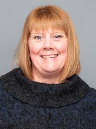 Portrait of Michelle LeBeau.