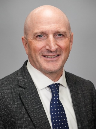 Portrait of Scott Comeau.