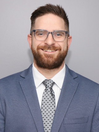 Headshot of Joey Tousignant, DO.