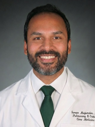 Headshot of Suman Majumdar, MD.