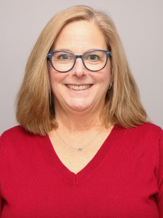 Headshot of Deborah Gardiner, PT, CHT, ATC.