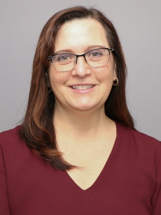 Headshot of Rebecca McCambridge, OT, CHT.