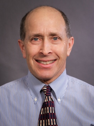 Headshot of Paul S. Unger, MD, FACP.