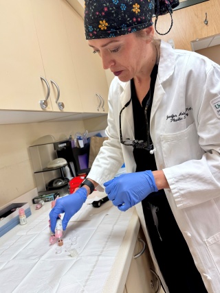 Jennifer Ashline, PA-C, prepares pigment for a nipple and areolar 3D tatto.