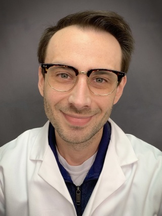 Headshot of Jason Beckta, MD.