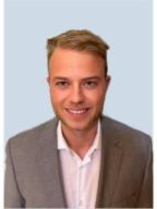 Headshot of Brendan Contompasis