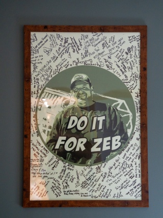 Photo of Zeb Maynard is signed with signatures from loved ones supporting him in his recovery.