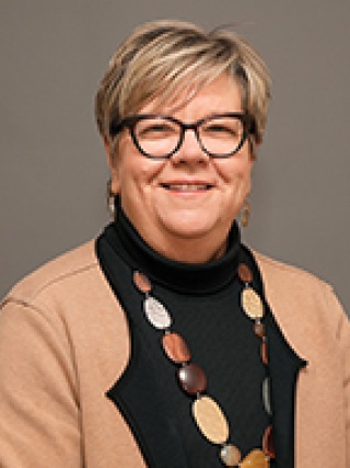 Headshot of Lauren Tronsgard-Scott, MSN, RN, MSOL Director, IP, PSS & LRC