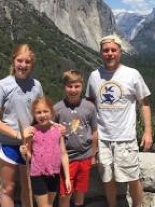 Timothy Whitman, DO and his family in the mountains