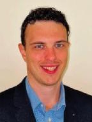 Headshot of Rhys Niedecker