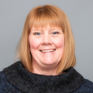 Portrait of Michelle LeBeau.