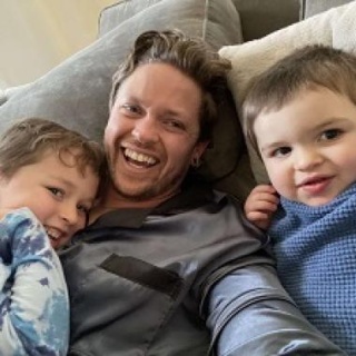 Nowland Matthew, MD takes selfie with his toddlers. 